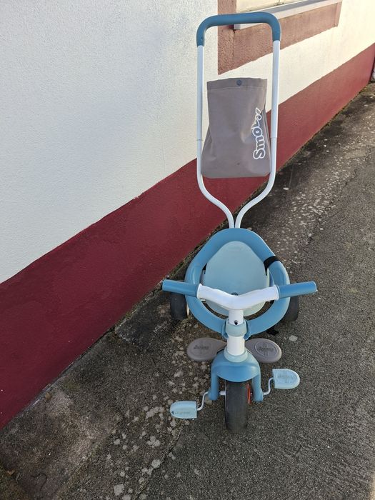 Triciclo smoby..