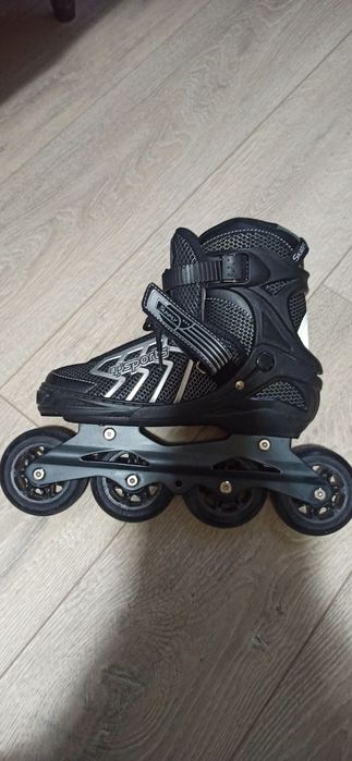 Роликовые коньки