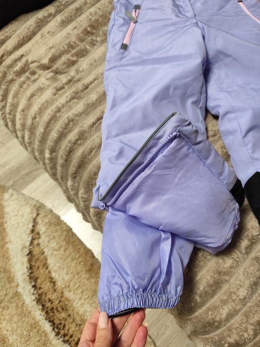 Продам,зимовий,непромокаючий дитячий напівкомбінезон.Розмір 116-122 см