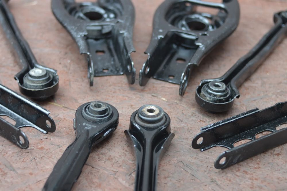 bmw e90 / e81 / e87 / e91 / e92 / e93 oryginalne wahacze tył lewe / p