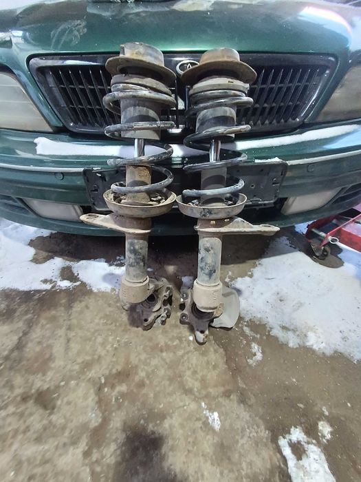 Стойка Нексия N100 Цапфа Стойки в сборе Кулак Амортизатор Daewoo Nexia