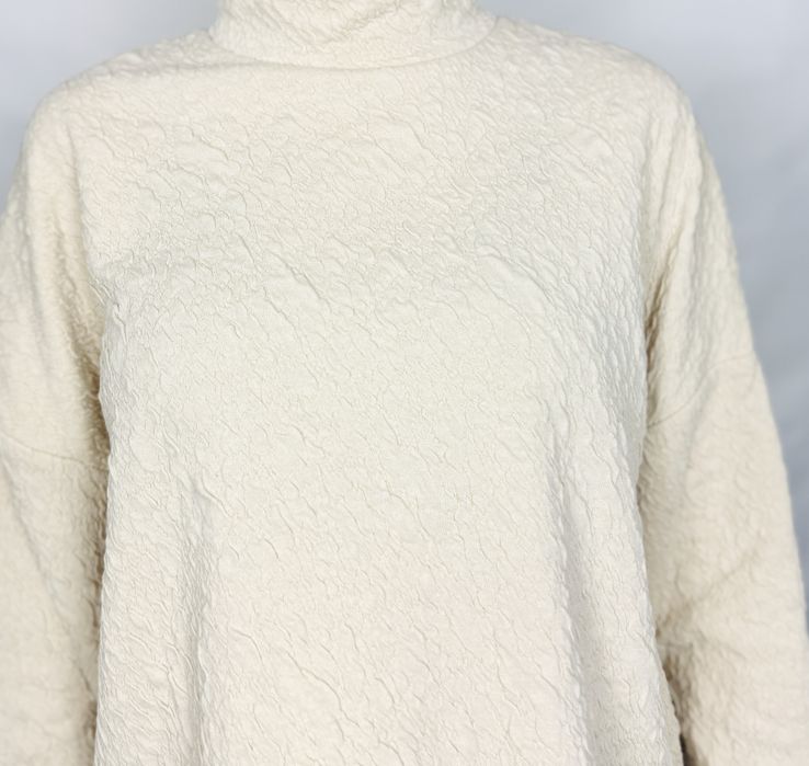 Kremowa bluzka z wysoką stójką S 36