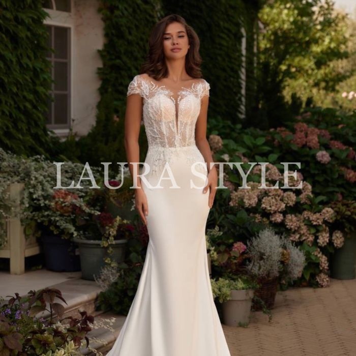 Прокат нових весільних суконь