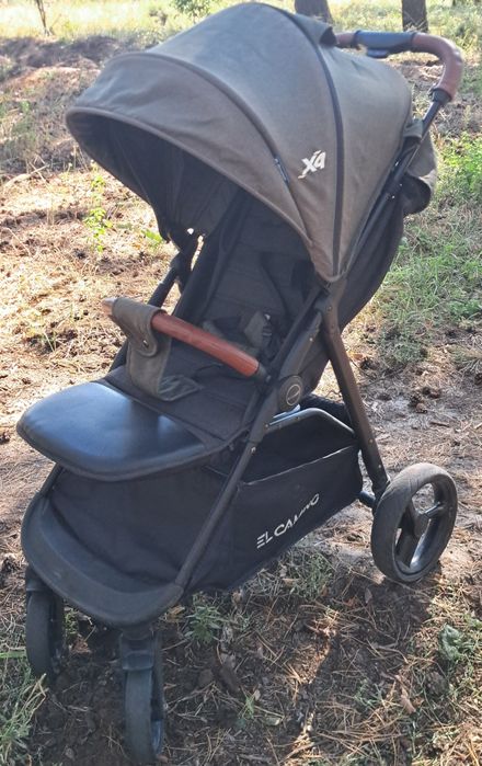 Прогулянкова дитяча коляска