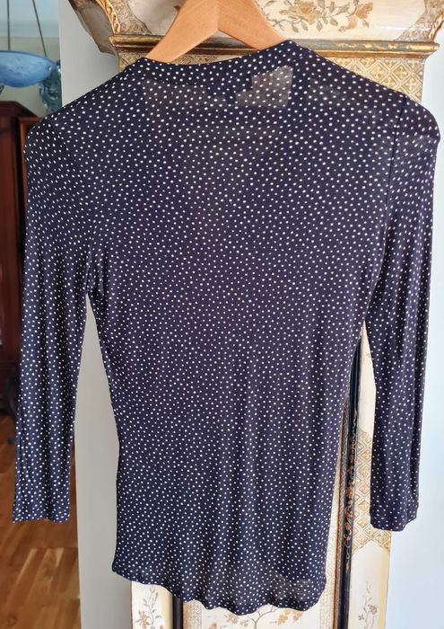 Sofisticada blusa preta da Caroll