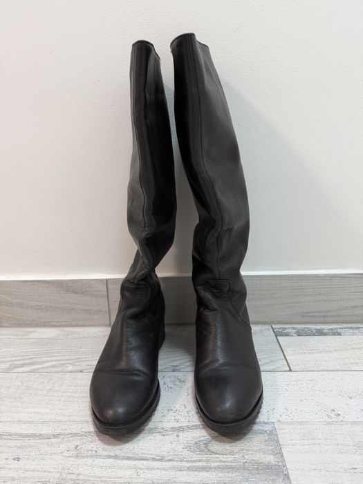 Шкіряні високі чоботи