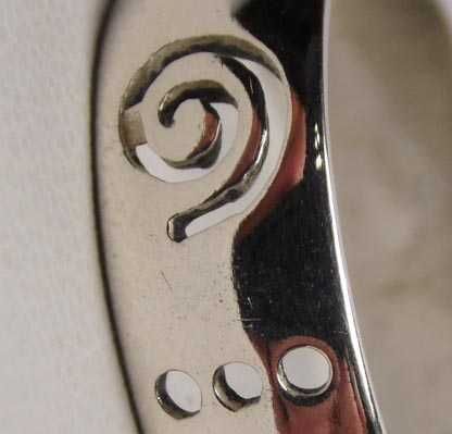 Srebrna obrączka wycinane wzorki R.26. 7 mm.