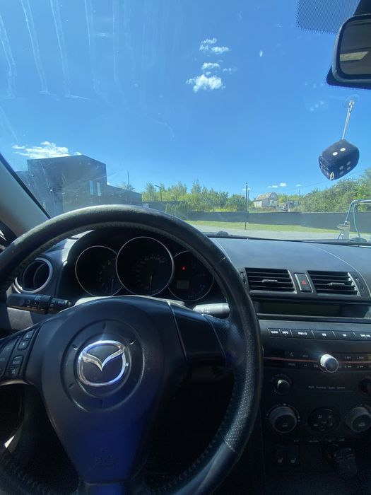 Mazda  3.   2004