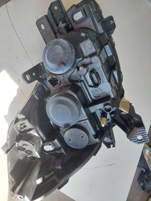 farol esq Renault clio 3