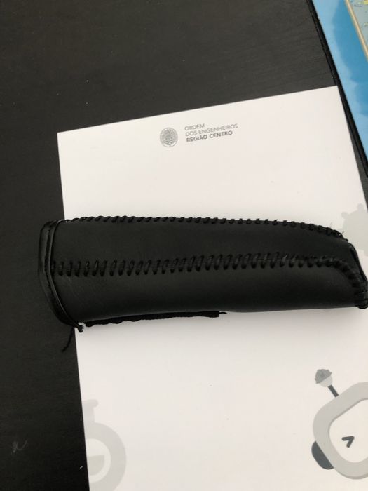 Proteção para travão de mão