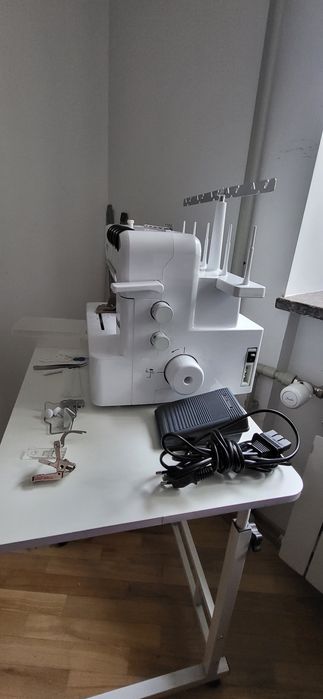 продам розпошивальну побутову машинку brather cover stitch cv 3550