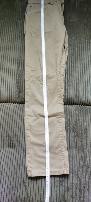 Levis 511 slim fit beżowe chinosy