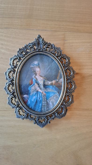 Portrety w ramkach z mosiądzu