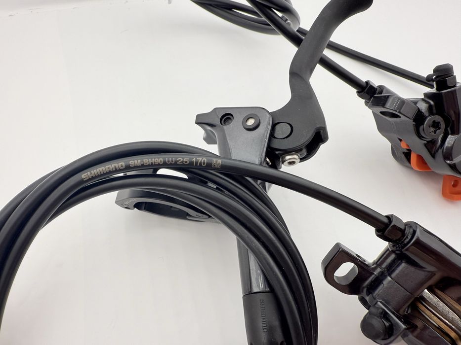 Нові гідравліні гальма Shimano Deore M6120 4 поршеві