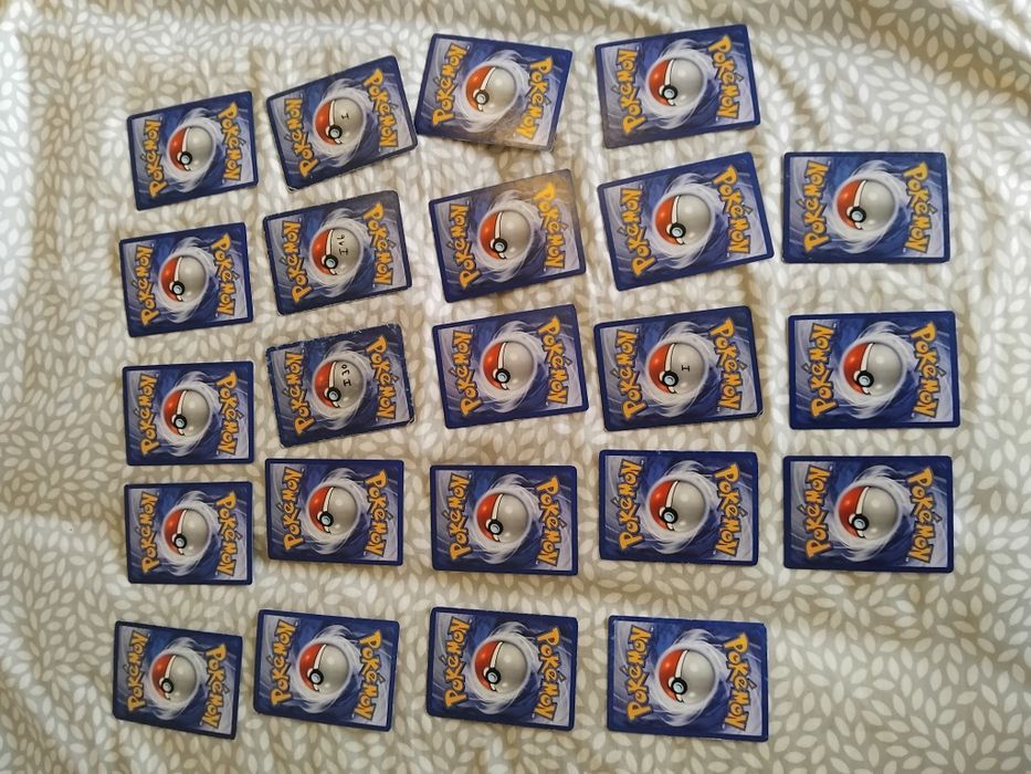 22 cartas pokemon originais 1a edição portuguesa  (pikachu,charmander)
