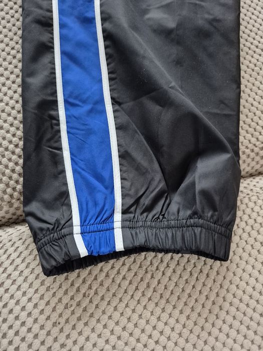 Nowe Spodnie Nike sportowe ortalionowe 137-147 M 10-12 YRS