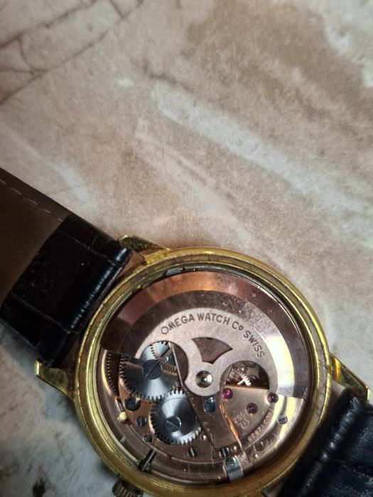 Omega złoto,stal