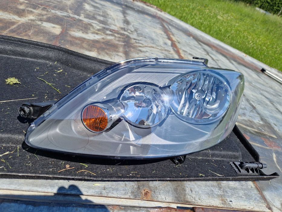 VW Golf + PLUS reflektor HELLA NOWY ORG