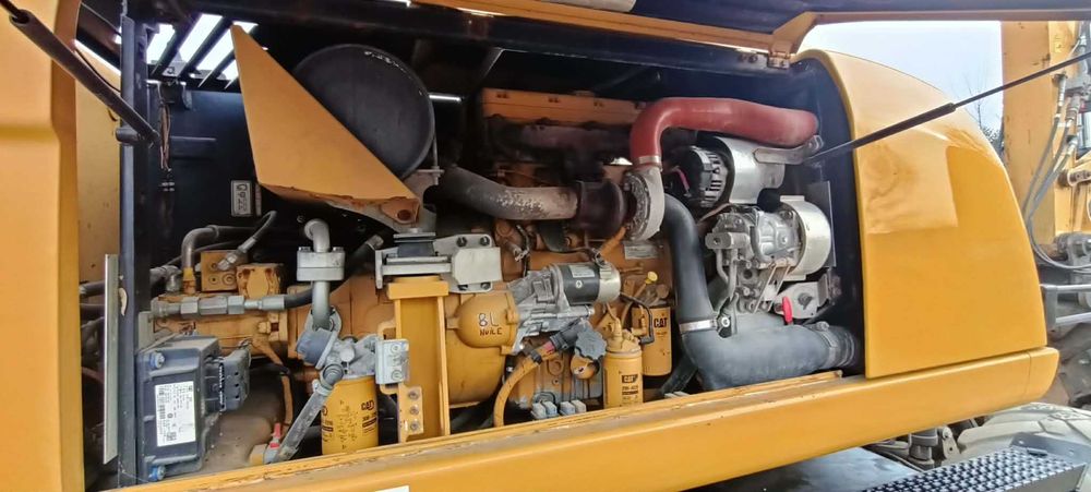CAT M313D 2014r 9900mtg Sprowadzona + 3 łyżki Rototilt Volvo EW140