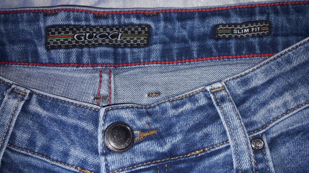 Spodnie jeansy GUCCI