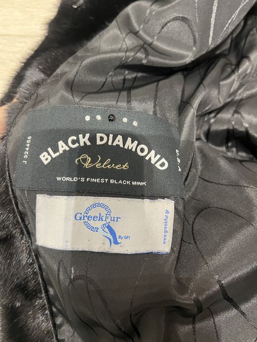 Норкова безрукавка