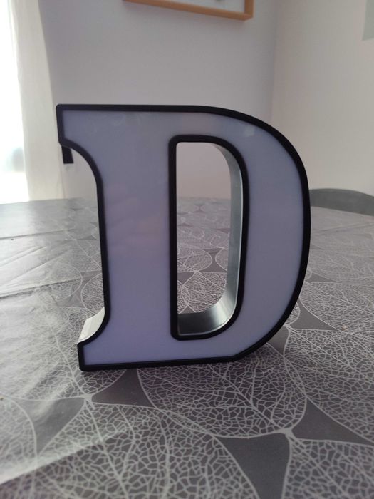 Letra iluminada D