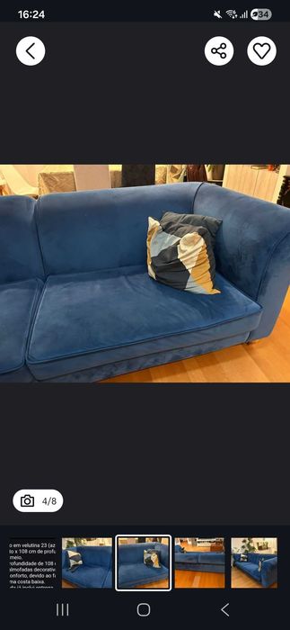 Sofa azul com pouco uso.