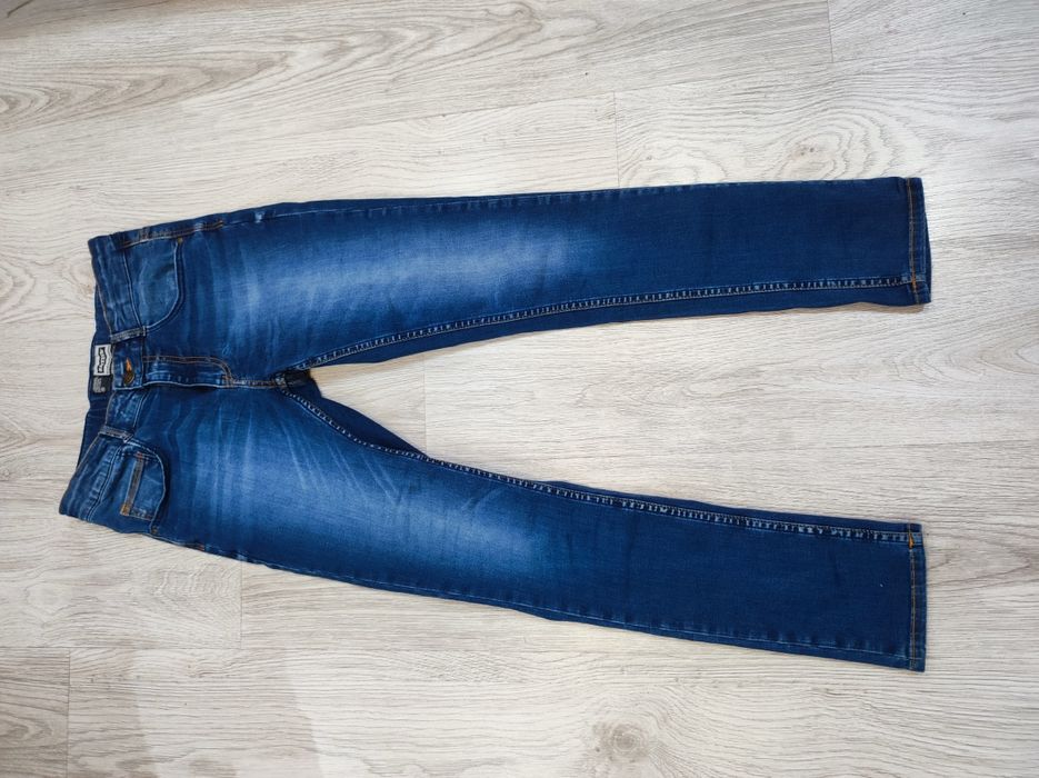 Spodnie jeans niebieskie gładkie wąskie rurki Raizzed XS