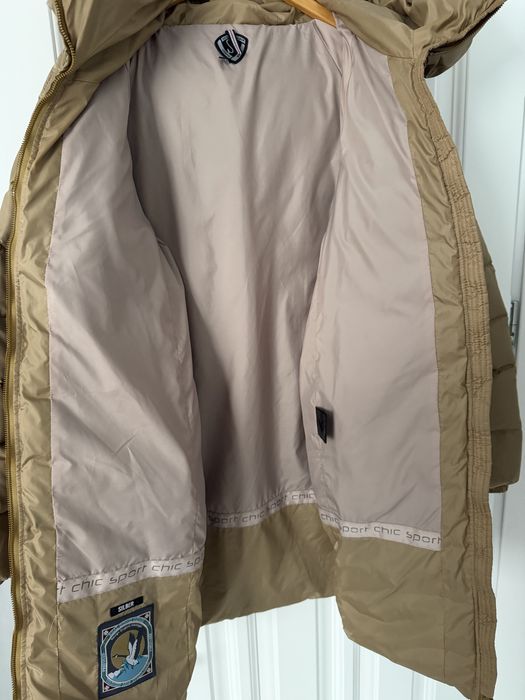 Жіночий пуховик, розмір М