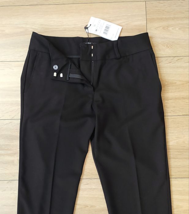 Eleganckie spodnie w kant czarne 36 S do kostek