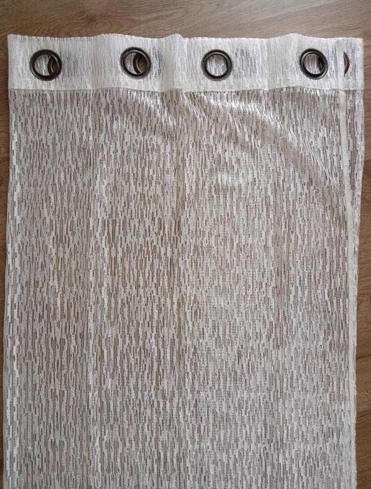 Тюль на кільцях.