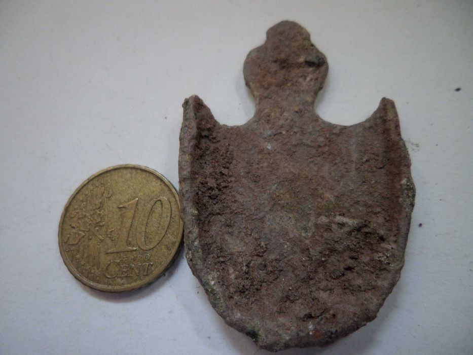 'Peça' antiga em Metal