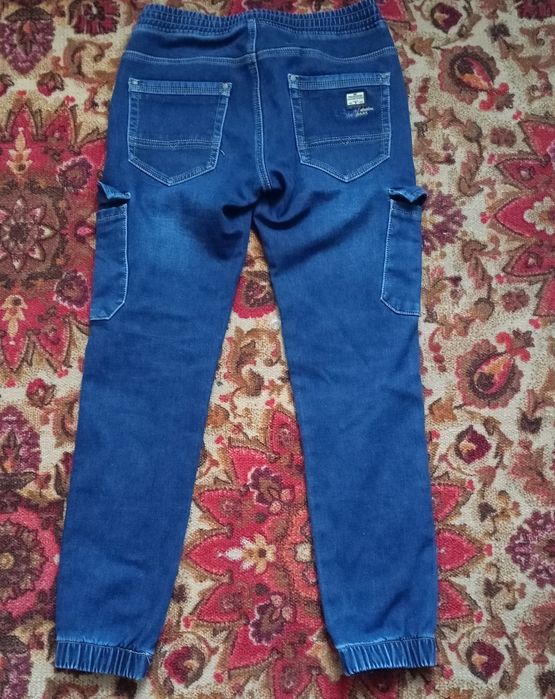 Чоловічі джинсии