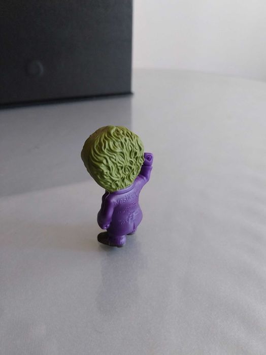 Figura de ação do personagem Joker, do universo Batman