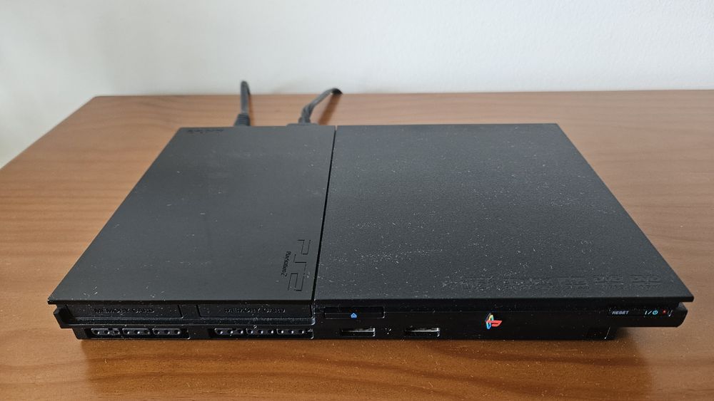 PS2 Slim com  52 jogos e comandos Buzz
