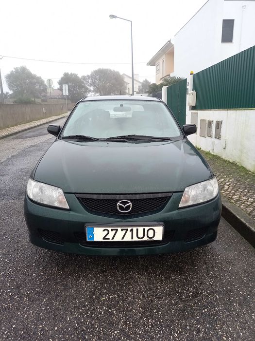 mazda 323 f bom e barato