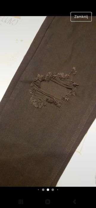 Nowe z metką Czarne spodnie wysoki stan z rozdarciami