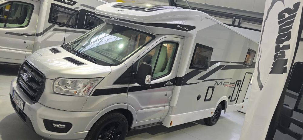 McLOUIS SLIM 339 UKŁAD ŁÓŻEK NIEMIECKICH GARAZ 6,69M 2.0 4 OSOBOWY  Pakiet Design Extra Assistance Markiza Fotowoltaika 200w