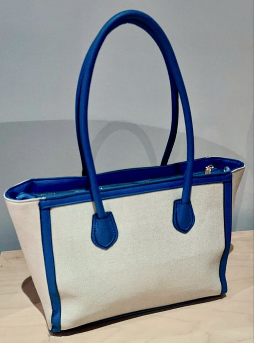 Carteira de lona em cor de ateia e azulão