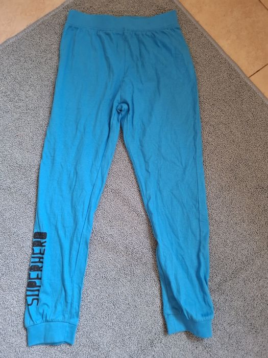 Nowe niebieskie spodnie legginsy chłopięce 122/128