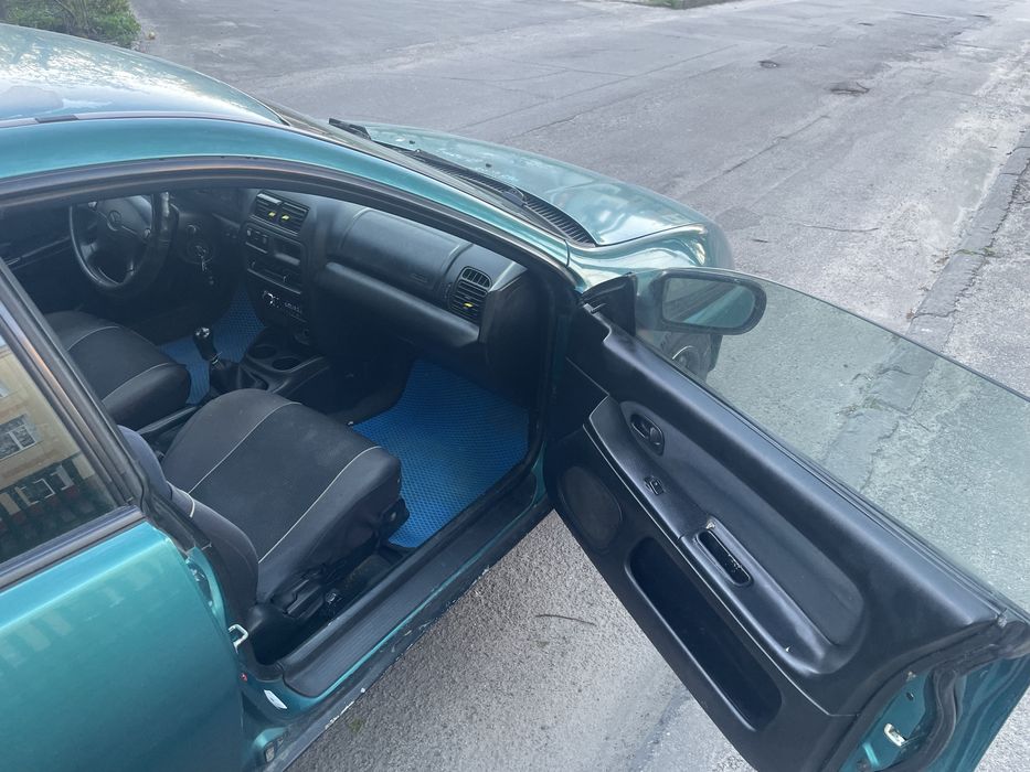 Мазда 323 1.5 газ/бензин