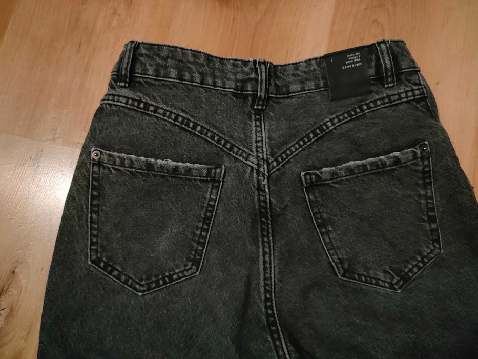 Jeansy damskie Reserved