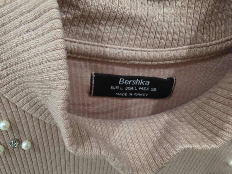 Camisola cor de rosa com pérolas