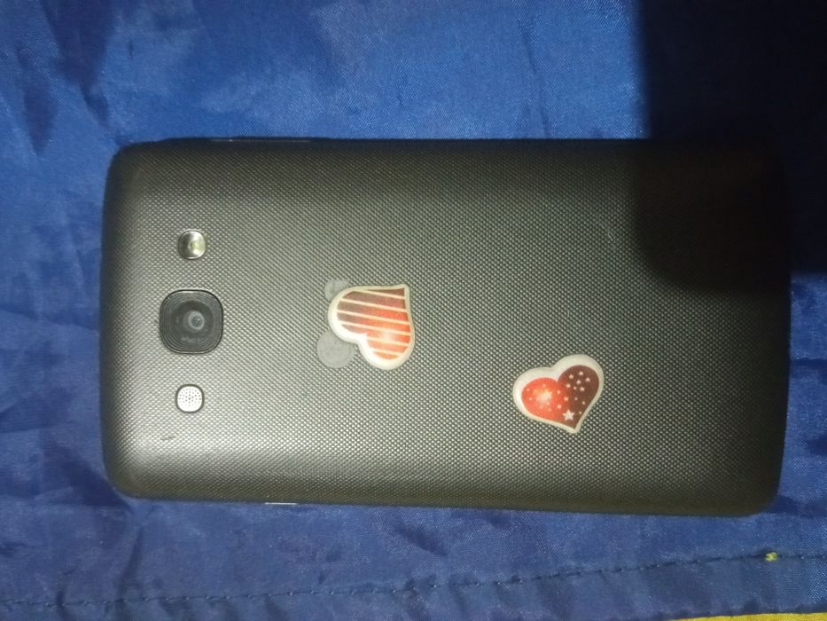 Продам телефон LG x135