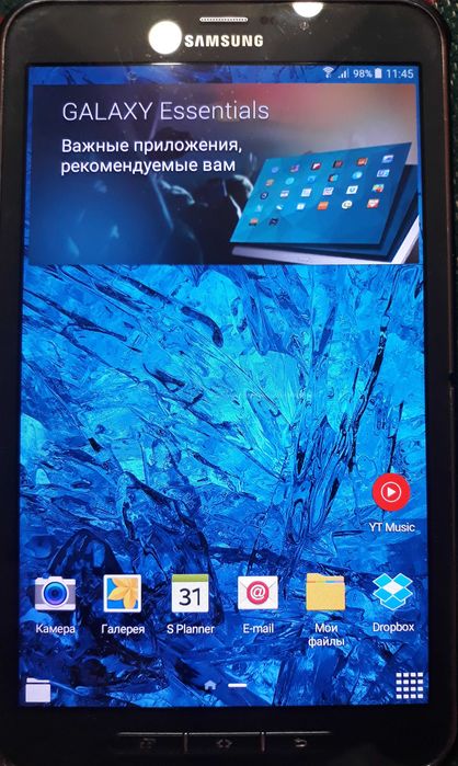 Планшет-телефон Samsung Galaxy  SM-T365 в чохлі з клавіатурою.