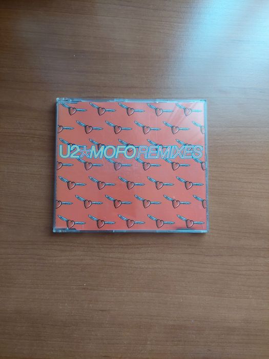 U2 CD - Mold Remixed Tracks.431280015698176002