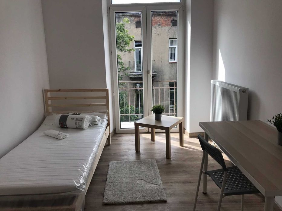 Pokoje w centrum miasta/ Rooms in the city center