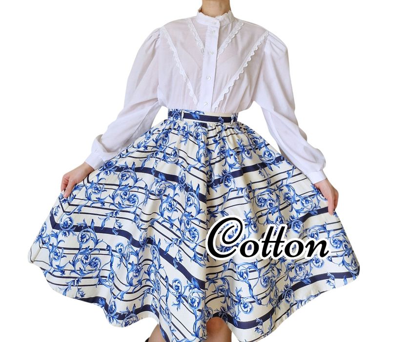 Midi rozkloszowana spódnica  w kwiaty XS