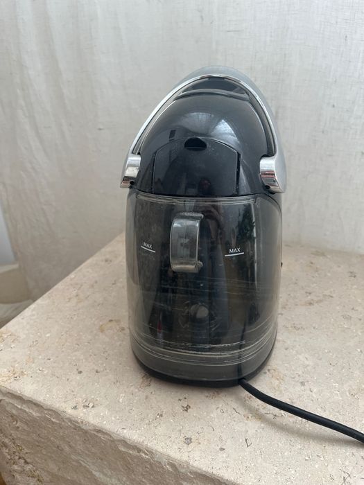 Ekspres do kawy kapsułkowy Tchibo cafissimo czarny