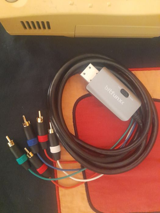 Dreamcast japonesa (60Hz) c/ fonte RetroPSU externa (europeia)